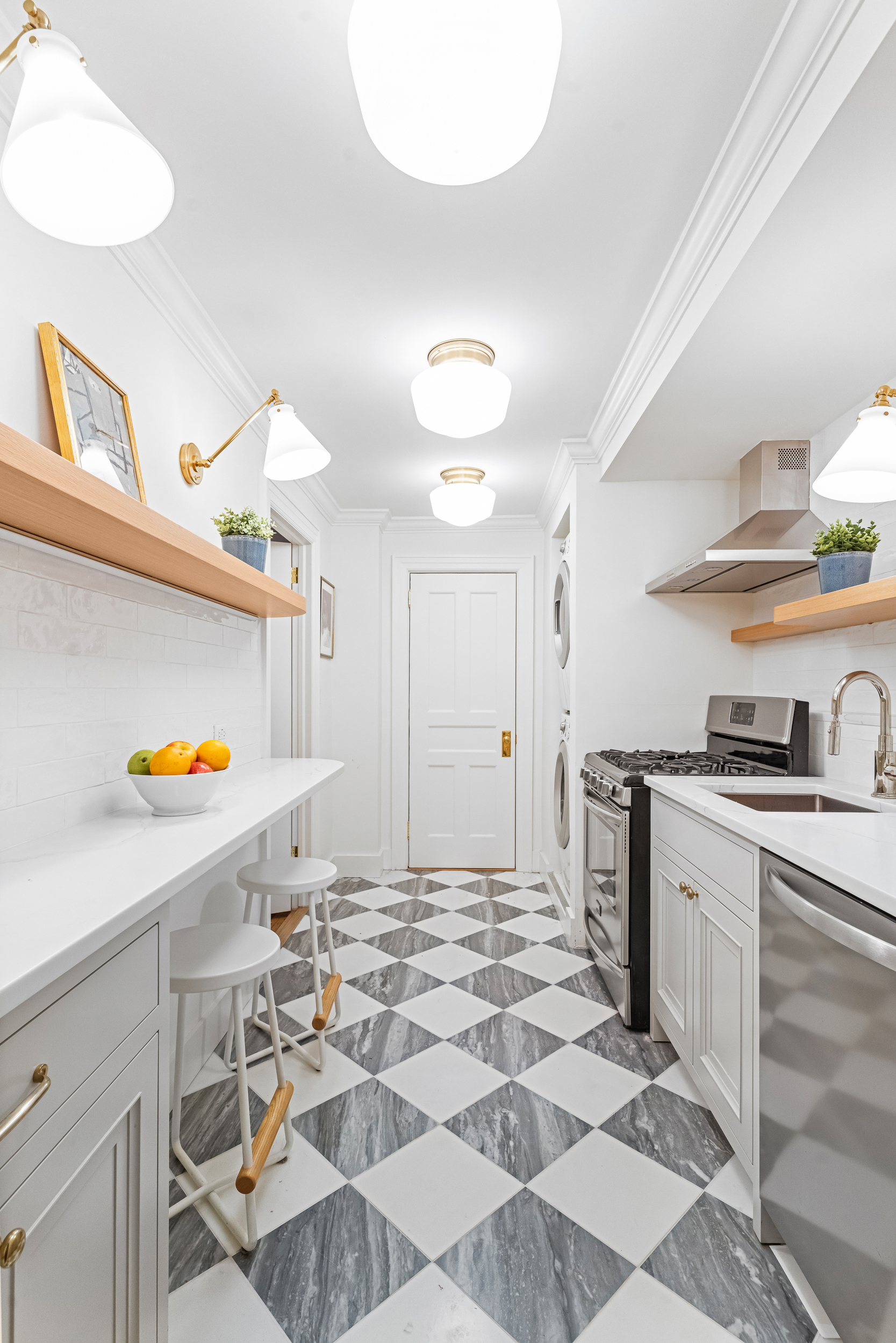 479 4th Street, Unit GARDEN Brooklyn, NY 11215 - Photo 5 of 8 a kitchen with granite countertop a sink and a stove