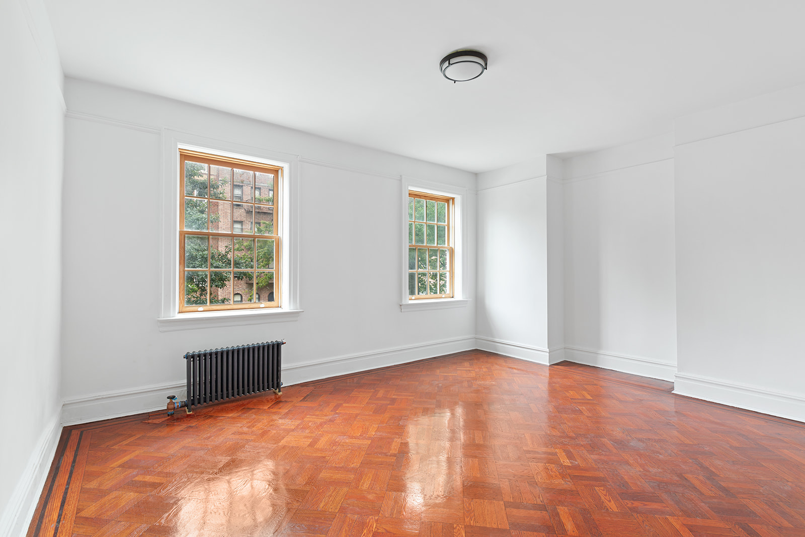 165 Fenimore Street Brooklyn, NY 11225 - Photo 5 of 13 an empty room with a window