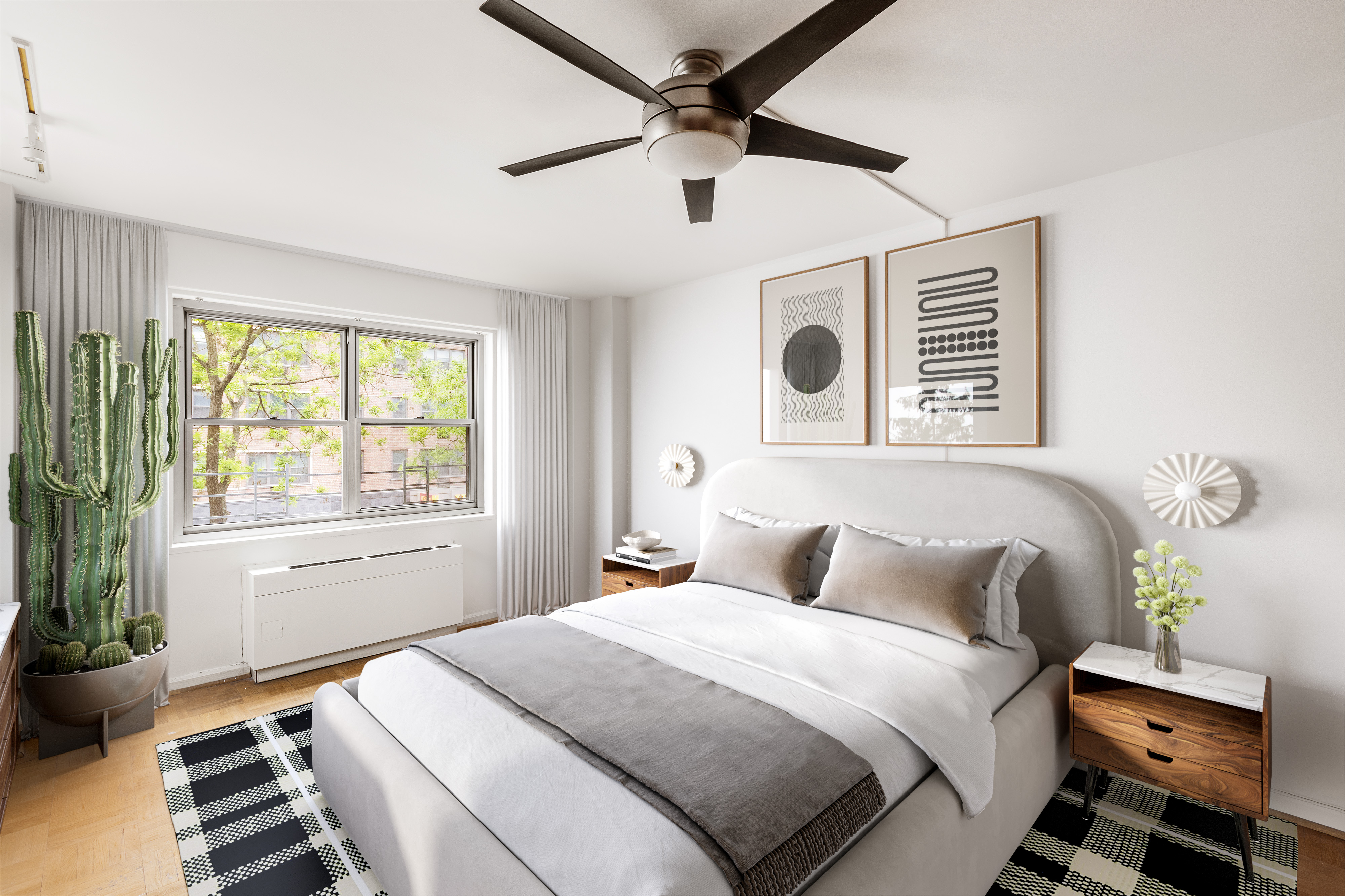 70 East 10th Street, Unit 3M Manhattan, NY 10003 - Photo 7 of 14 a bedroom with a large bed and a window