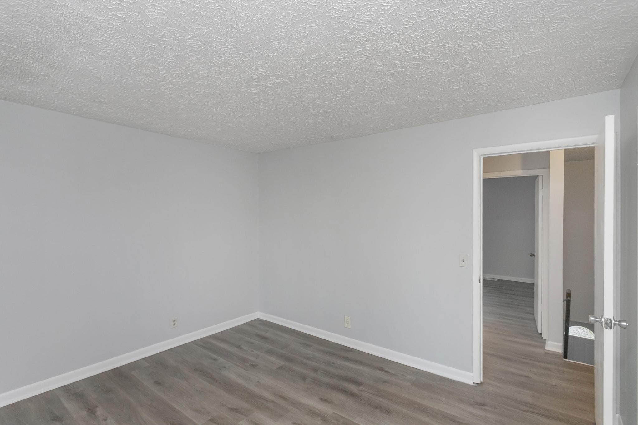 Falls Creek Drive, Unit 3307 & 3309 Nashville, TN 37214 - Photo 33 of 51 a view of an empty room and wooden floor