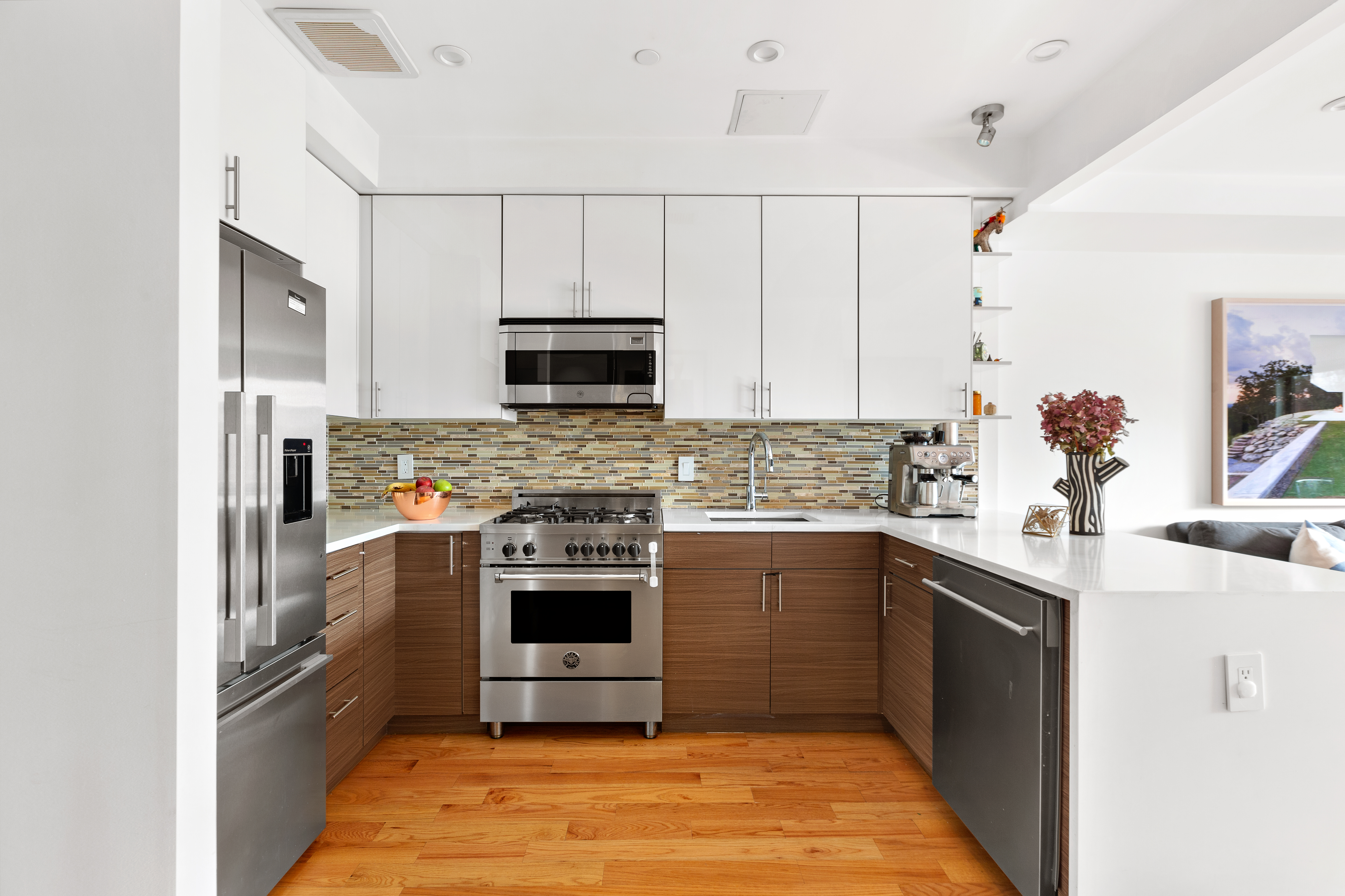 39 Madison Street, Unit 3B Brooklyn, NY 11238 - Photo 4 of 16 a kitchen with stainless steel appliances a sink stove and refrigerator