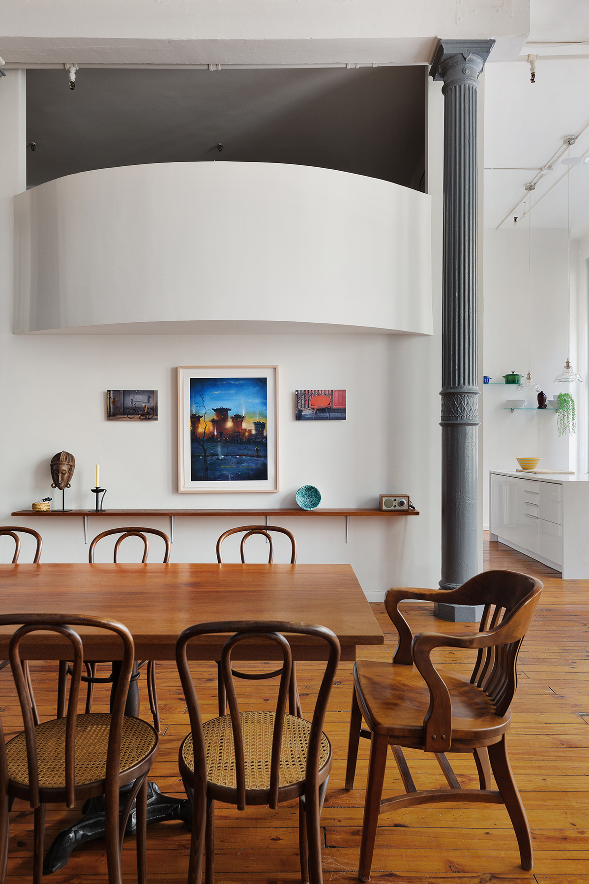135 Greene Street, Unit 2N Manhattan, NY 10012 - Photo 2 of 13 a view of a dining room with furniture and wooden floor