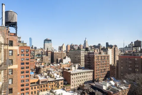a view of a city with tall buildings
