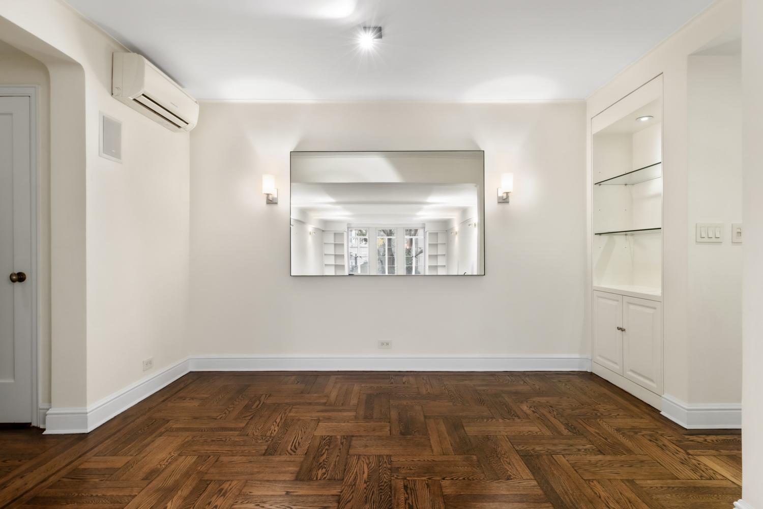 110 East 87th Street, Unit 2C Manhattan, NY 10128 - Photo 8 of 13 a view of an empty room and window
