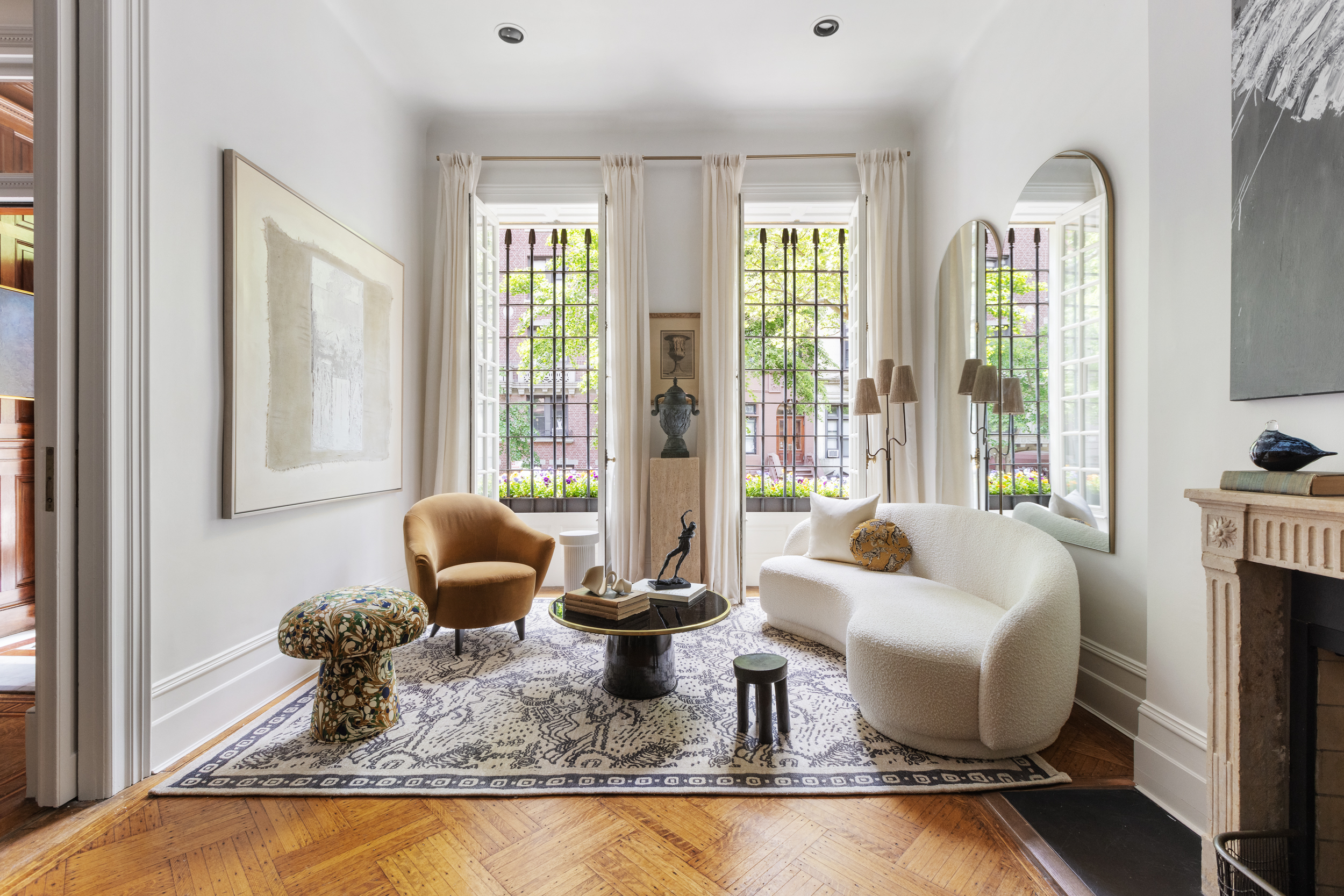 37 West 70th Street Manhattan, NY 10023 - Photo 6 of 41 a living room with fireplace furniture and floor to ceiling window