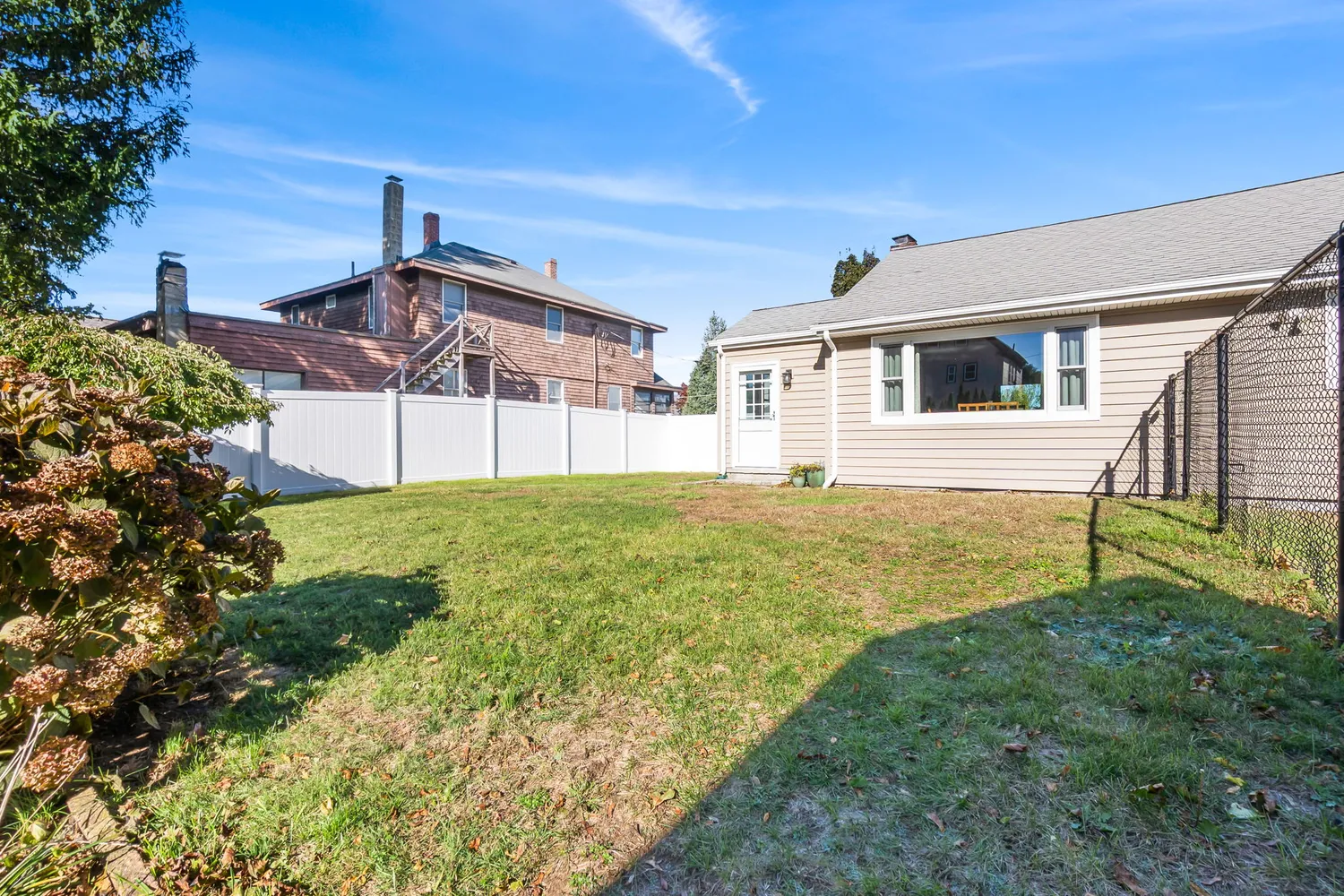 a house view with a garden space