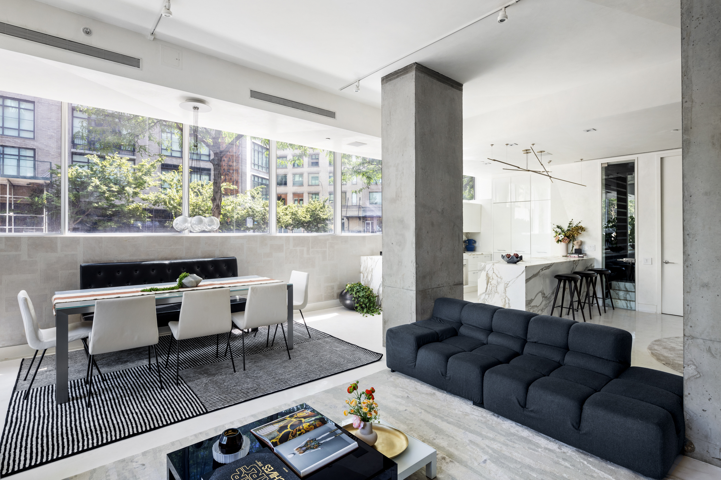 471 Washington Street, Unit 1B Manhattan, NY 10013 - Photo 8 of 17 a living room with furniture and a large window