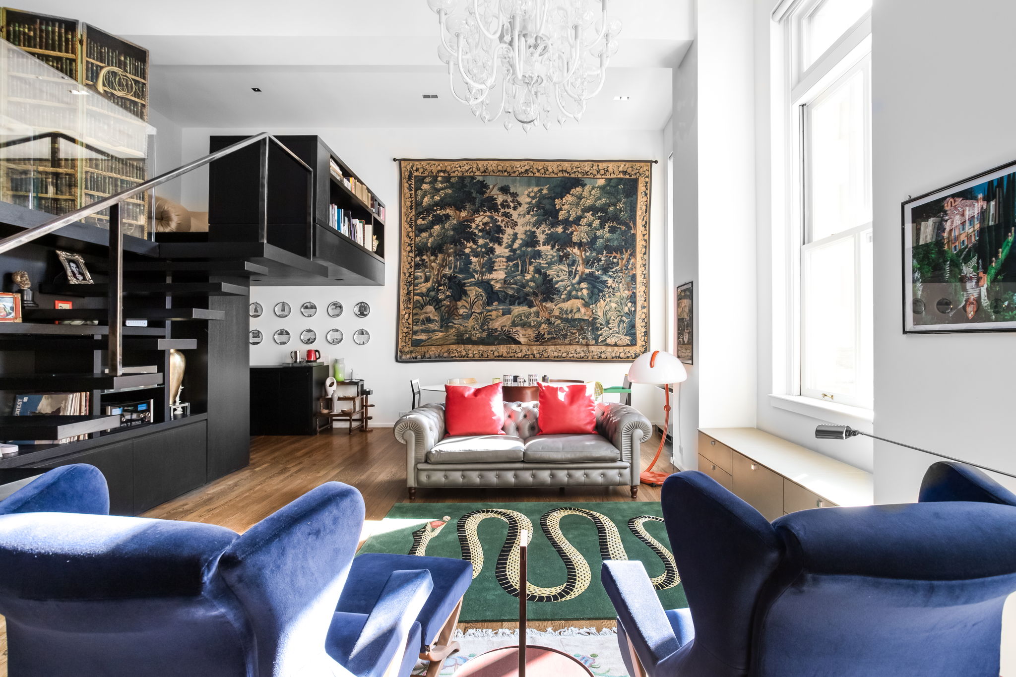 240 Centre Street, Unit 3H Manhattan, NY 10013 - Photo 1 of 20 a living room with furniture a fireplace and a flat screen tv