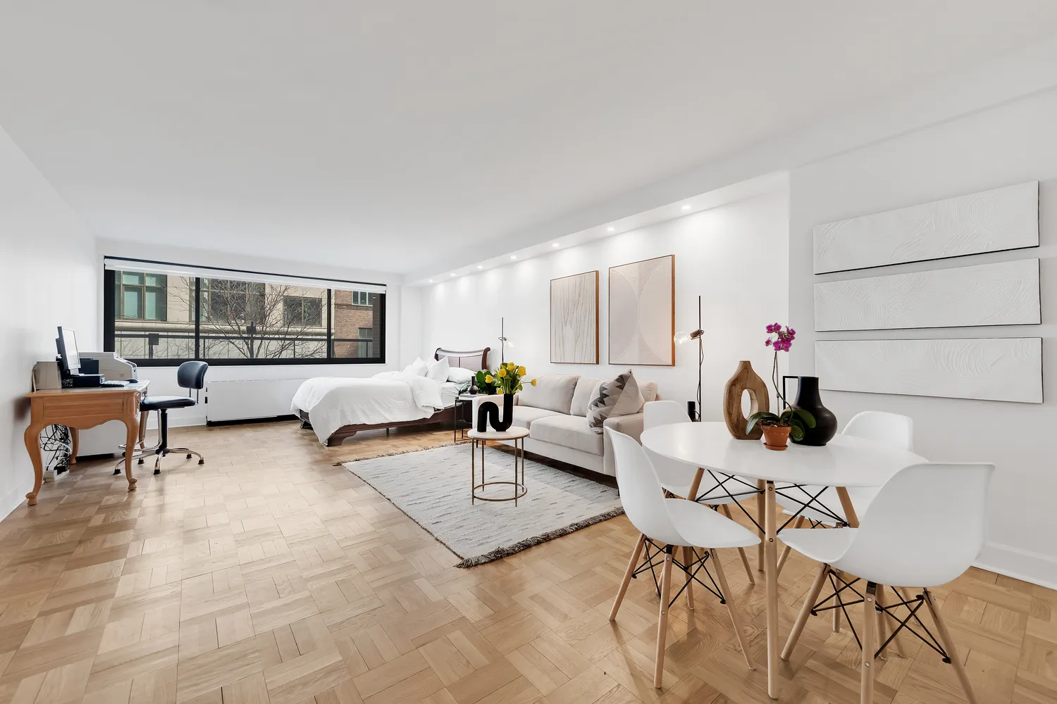 a living room with furniture and a window