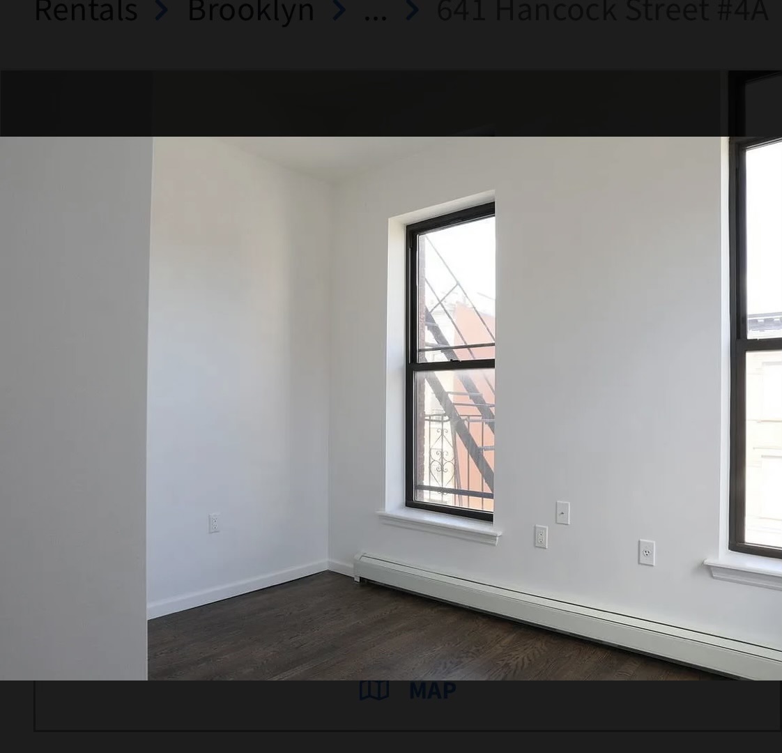 641 Hancock Street, Unit 4L Brooklyn, NY 11221 - Photo 5 of 7 a view of an empty room with wooden floor and a window