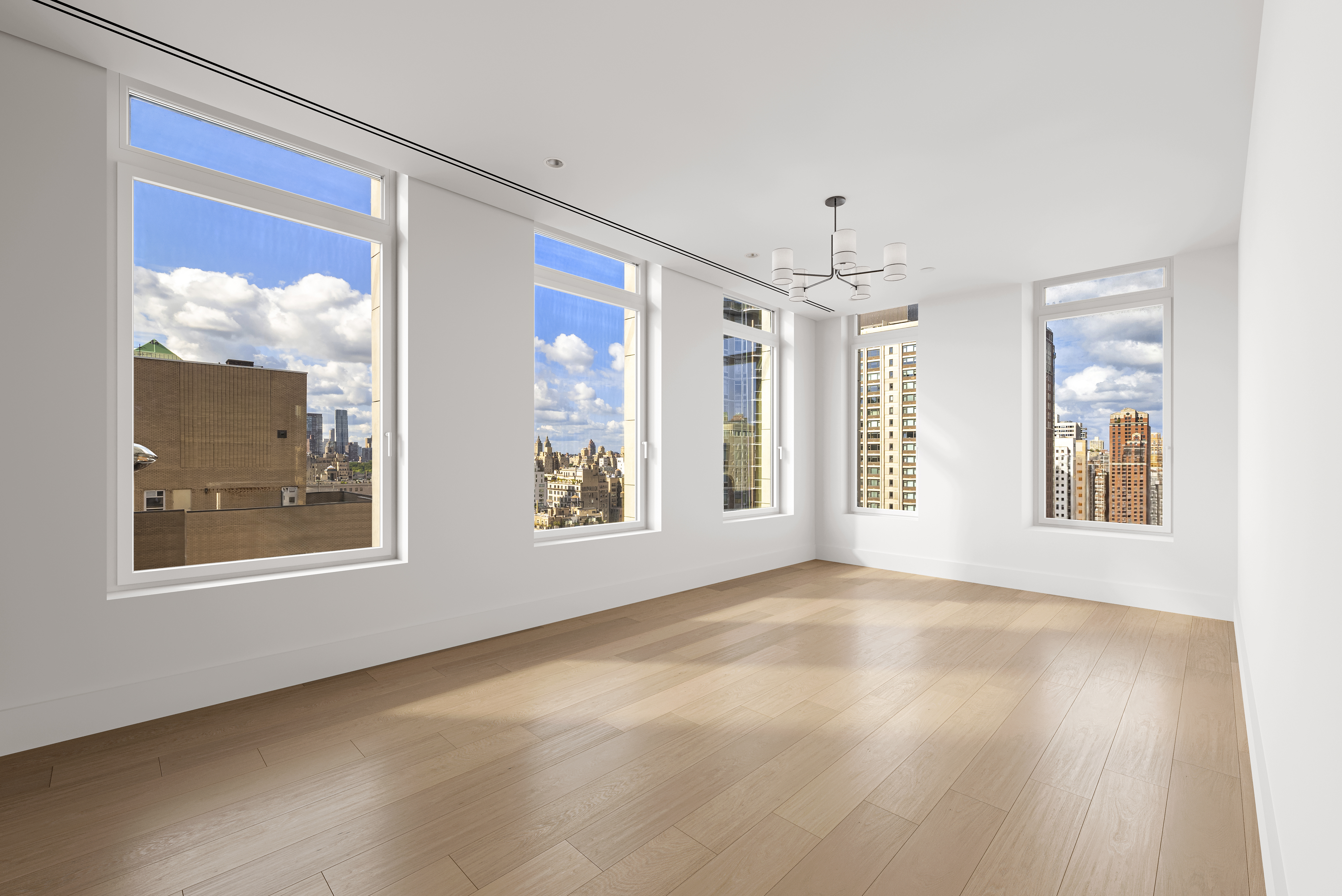 1059 3rd Avenue, Unit 21B Manhattan, NY 10065 - Photo 7 of 13 a view of an empty room with windows