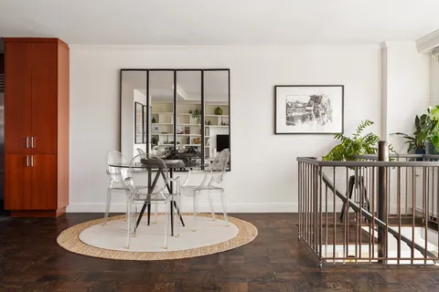 a vase of flowers sitting on a table
