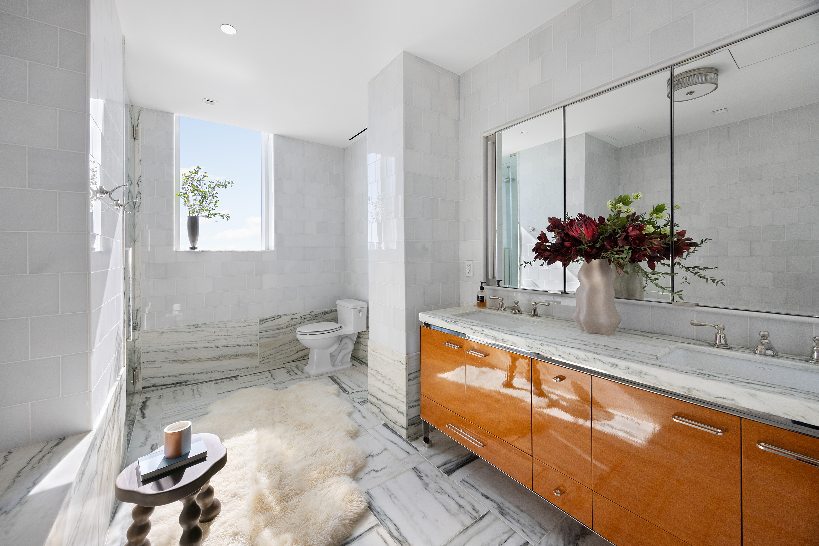 45 East 22nd Street, Unit 32B Manhattan, NY 10010 - Photo 25 of 36 a bathroom with a sink a toilet and a bathtub