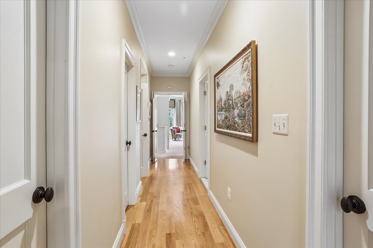 11736 Gainsborough Road Potomac, MD 20854 - Photo 55 of 90 a view of a hallway with wooden floor and closet