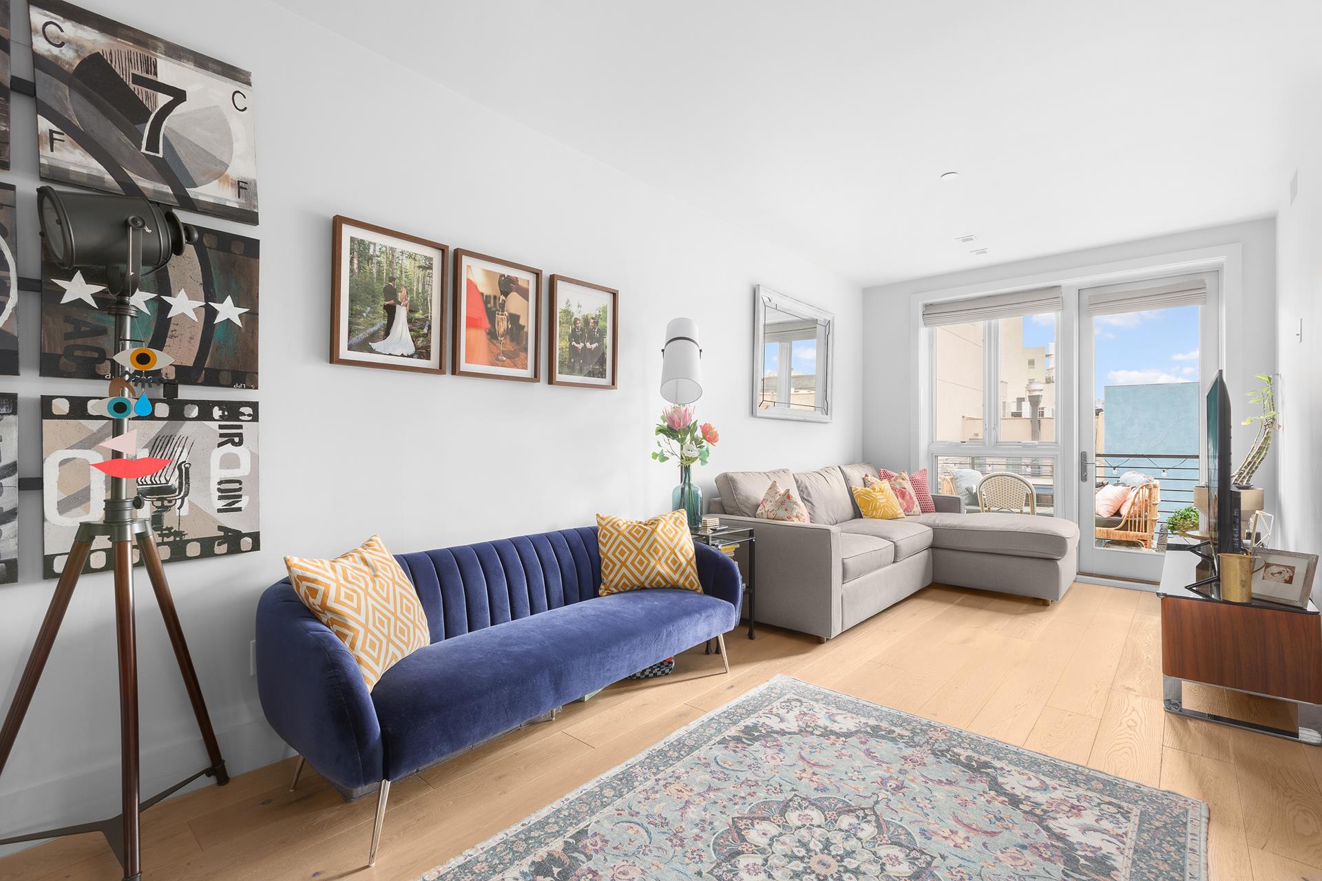 800 Dean Street, Unit PH Brooklyn, NY 11238 - Photo 1 of 11 a living room with furniture and a couch
