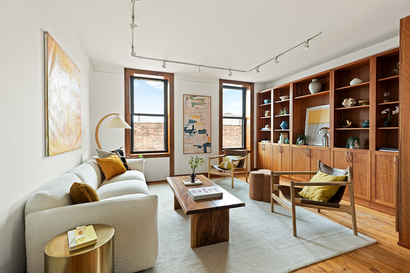 375 Lincoln Place, Unit 4F Brooklyn, NY 11238 - Photo 1 of 10 a living room with furniture fireplace and table