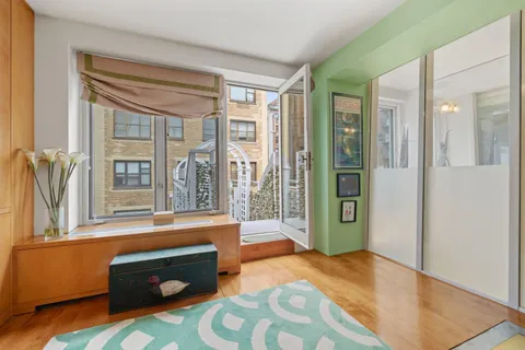 a room with furniture and window