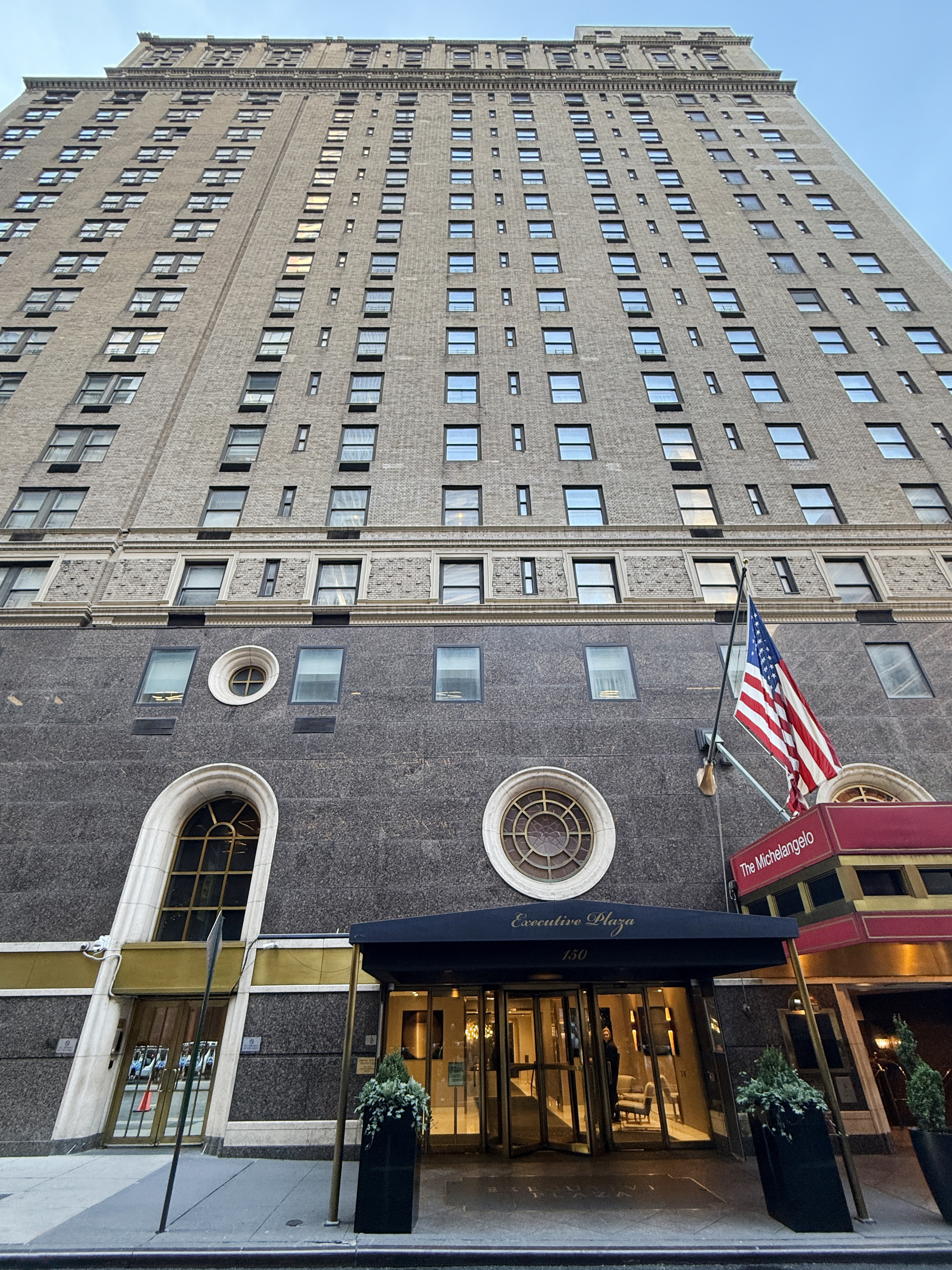 150 West 51st Street, Unit 1528 Manhattan, NY 10019 - Photo 18 of 21 a view of a balcony with chairs and wooden floor