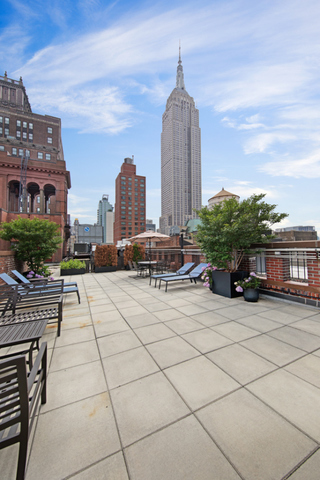 11 East 36th Street, Unit 306 Manhattan, NY 10016 - Photo 8 of 11 a view of a terrace with chairs