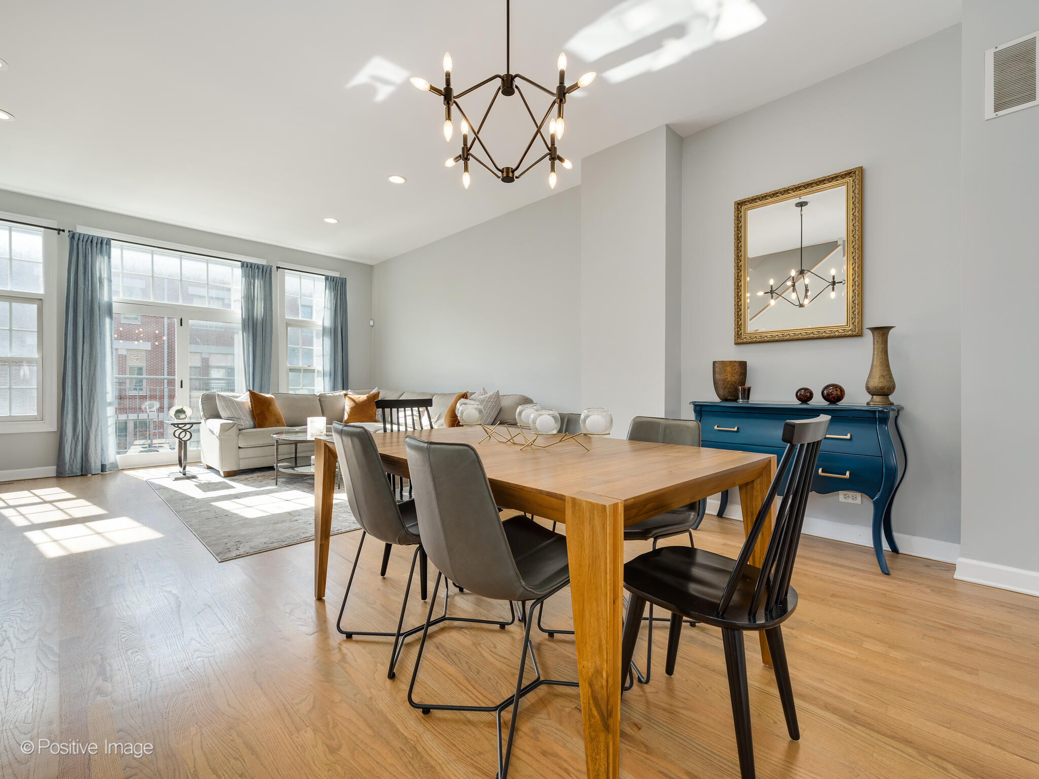 855 North May Street, Unit G Chicago, IL 60642 - Photo 5 of 28 a view of a dining room with furniture window and wooden floor