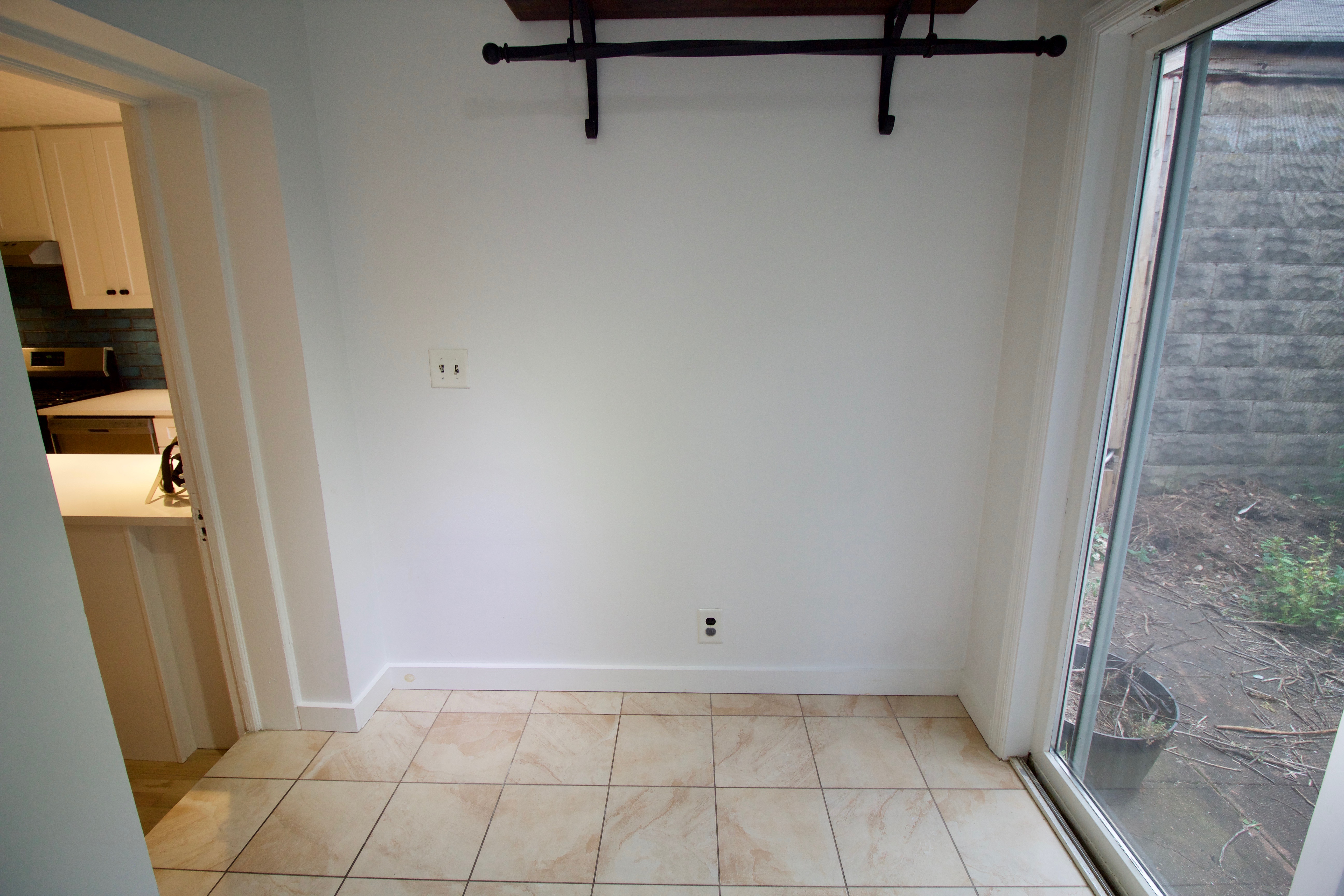 403 Caton Avenue, Unit 1 Brooklyn, NY 11218 - Photo 33 of 37 a view of a room with racks on the wall