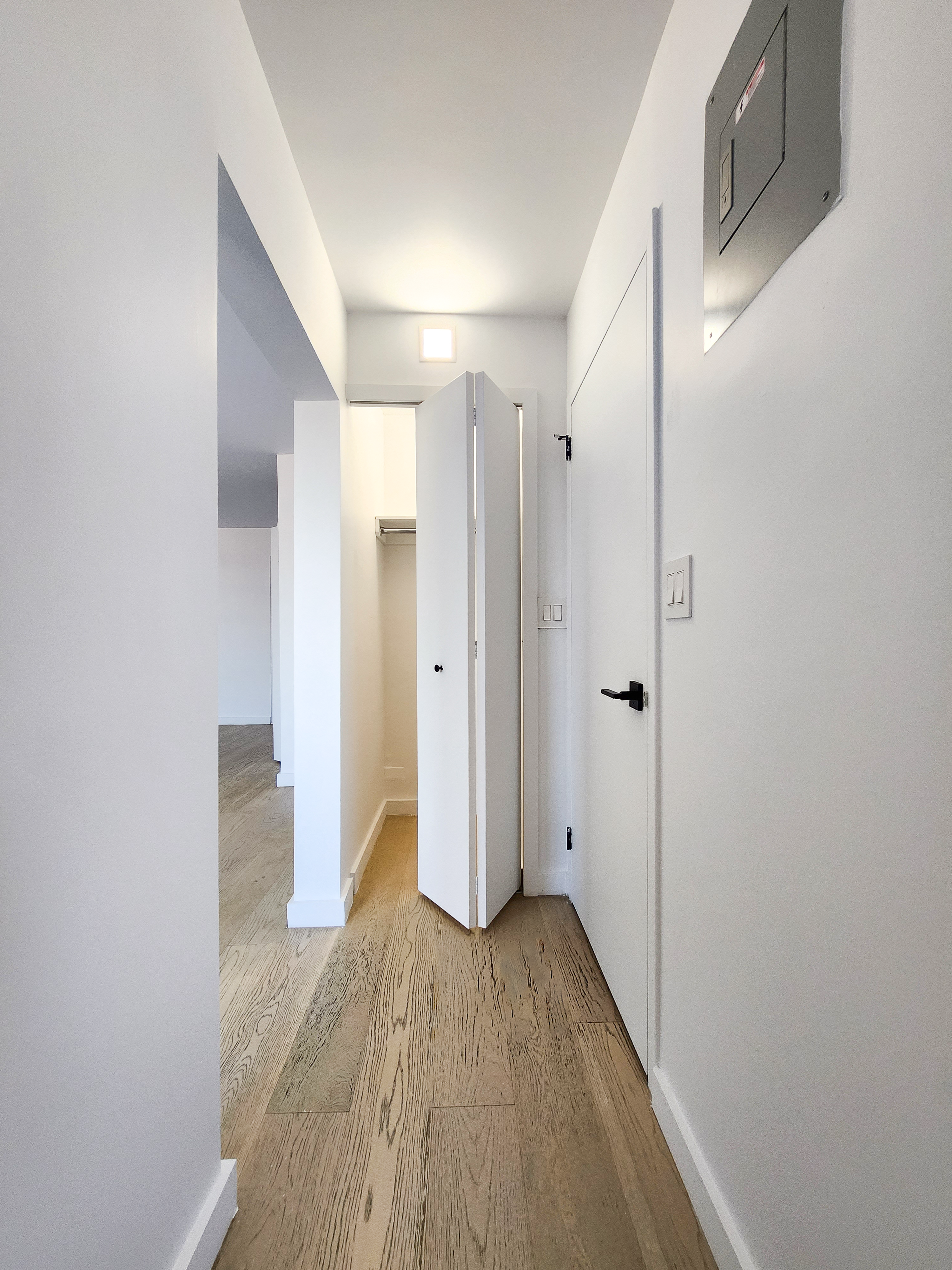 275 South Street, Unit 7PP Manhattan, NY 10002 - Photo 5 of 19 a view of entryway with wooden floor