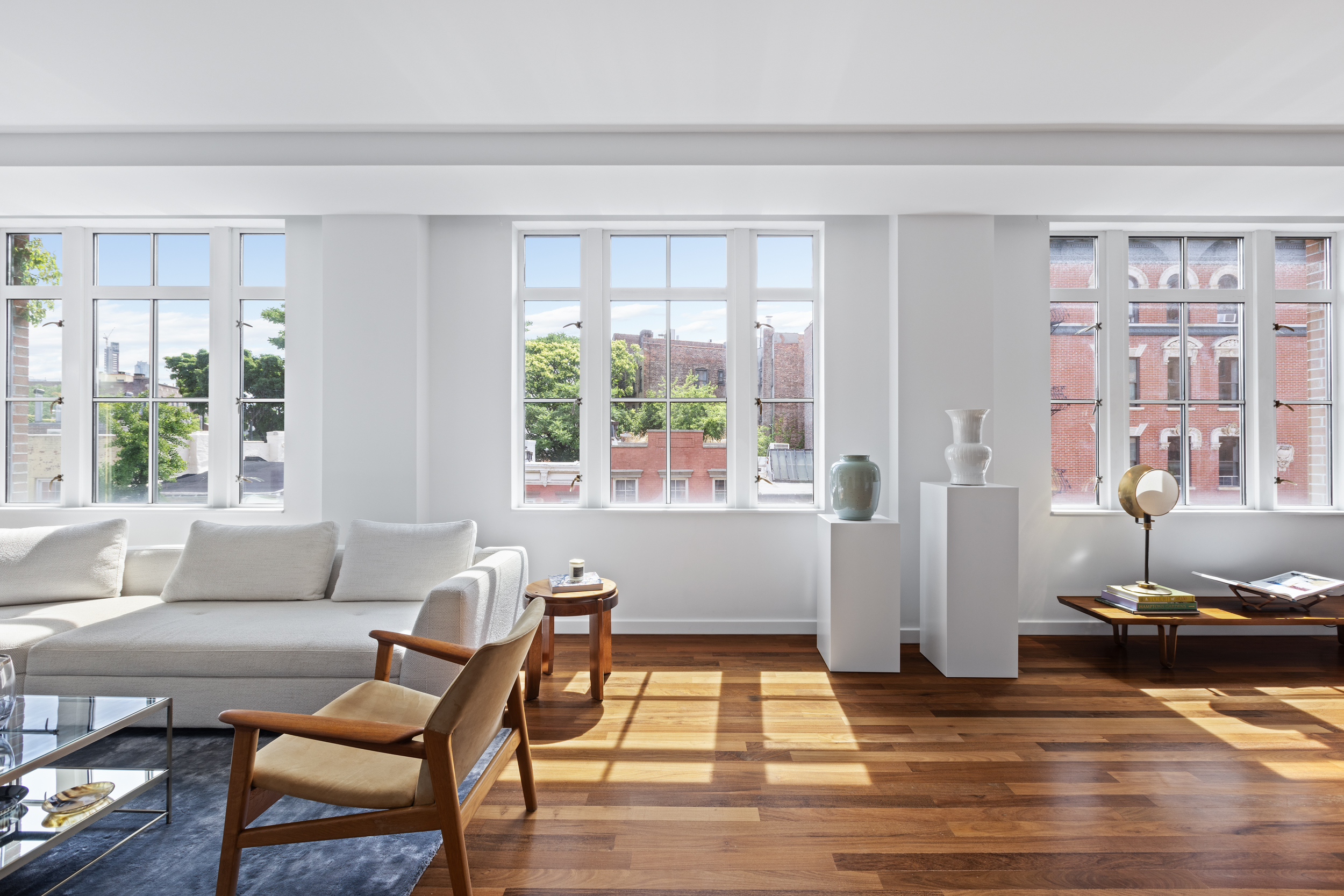 744 Greenwich Street, Unit 4 Manhattan, NY 10014 - Photo 7 of 34 a living room with furniture and wooden floor