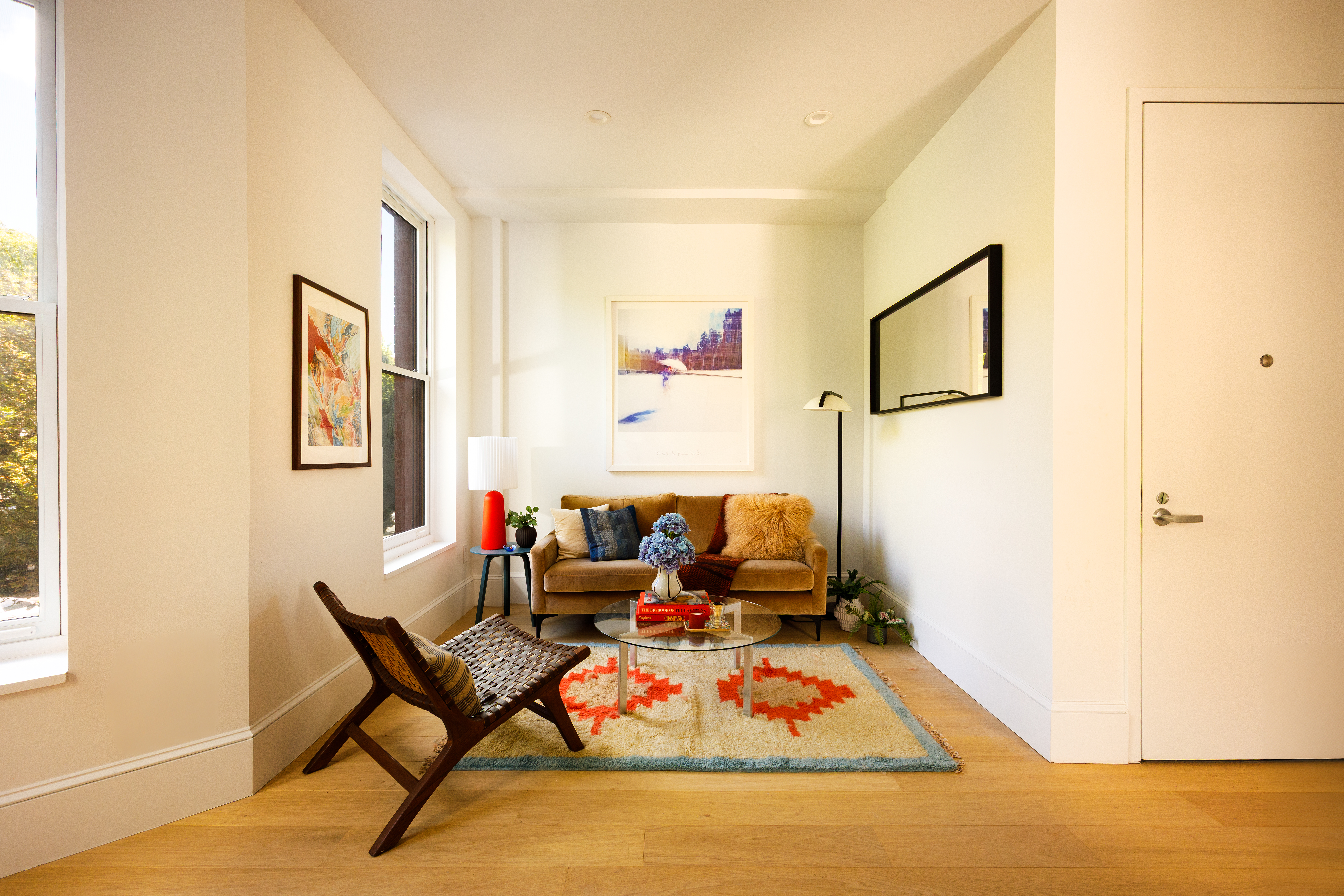 1370 Dean Street, Unit C Brooklyn, NY 11216 - Photo 1 of 7 a living room with furniture and a rug
