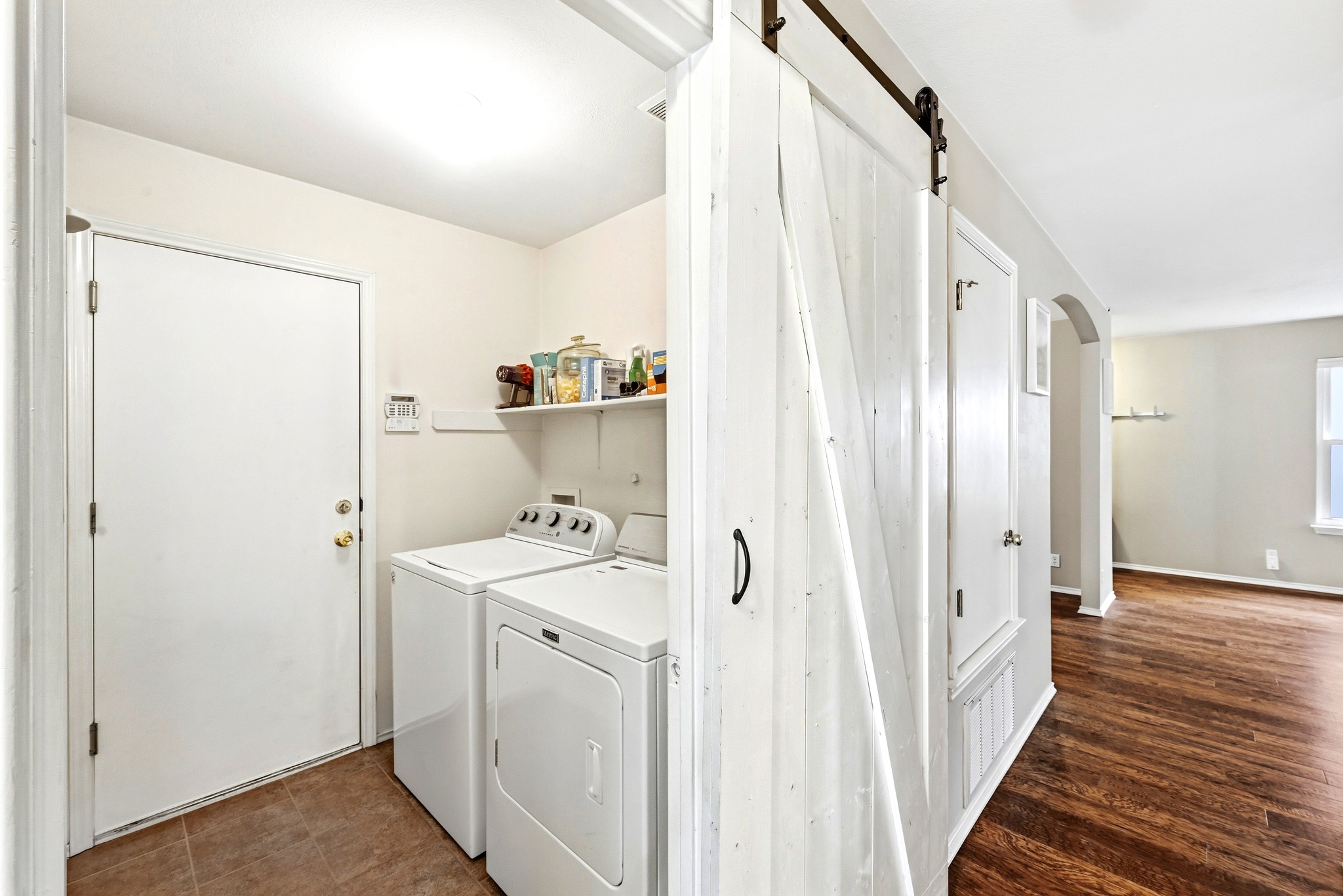 8901 Frock Court Austin, TX 78748 - Photo 24 of 28 a view of a hallway with washer and dryer