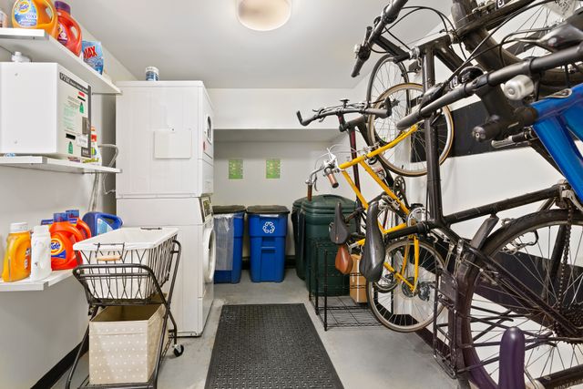 569 Carroll Street, Unit 9 Brooklyn, NY 11215 - Photo 11 of 15 a utility room with multiple dryer and washer