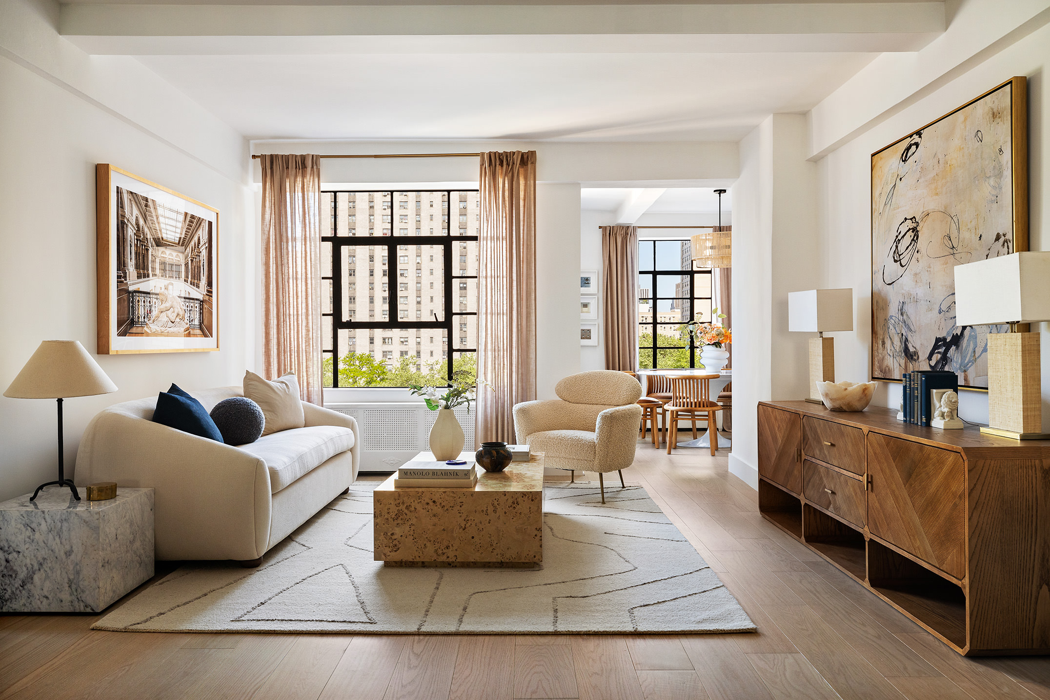 320 Central Park West, Unit 7L Manhattan, NY 10025 - Photo 2 of 16 a living room with furniture and large windows