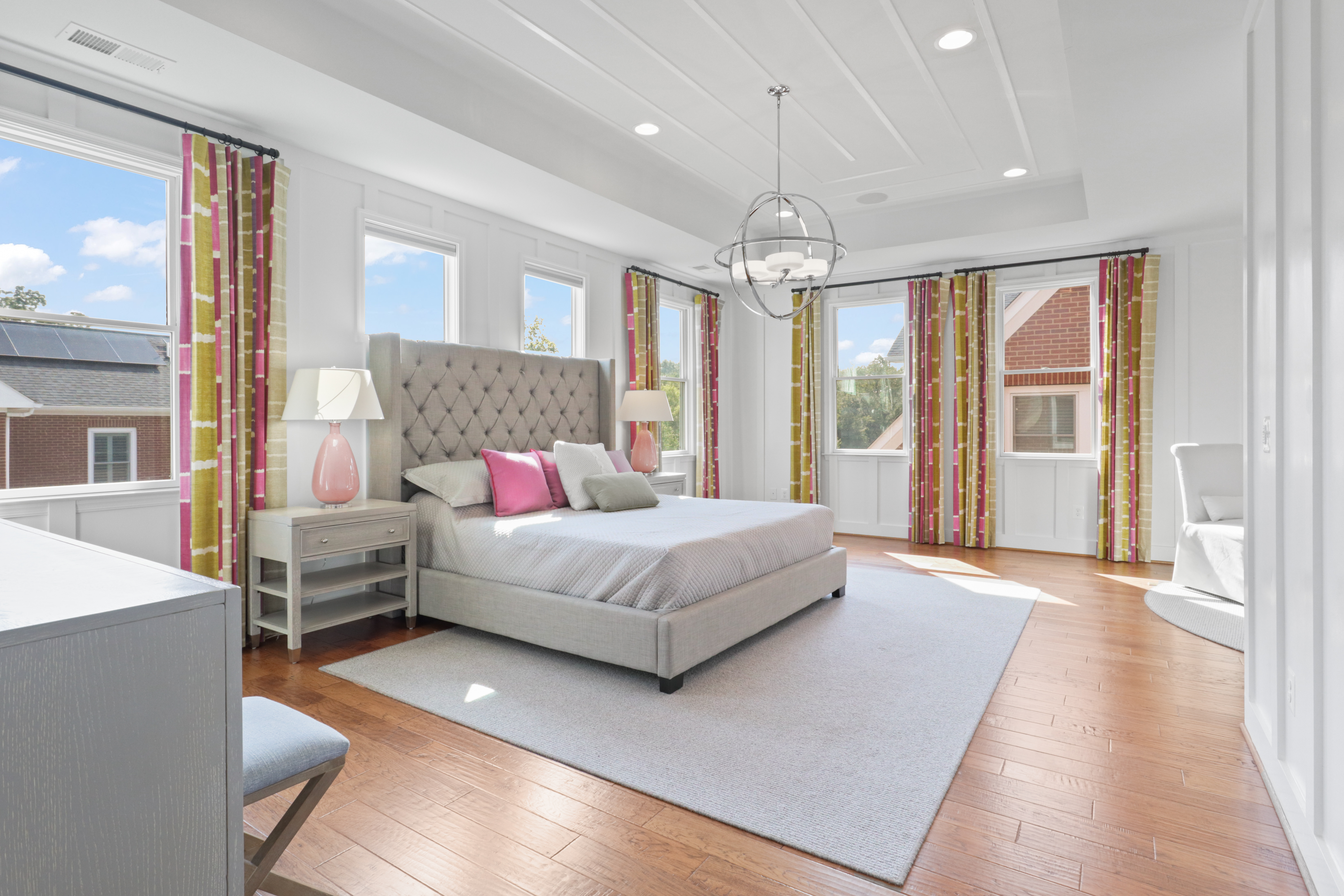 9101 Power House Road Lorton, VA 22079 - Photo 41 of 75 a bedroom with a large bed and a chandelier