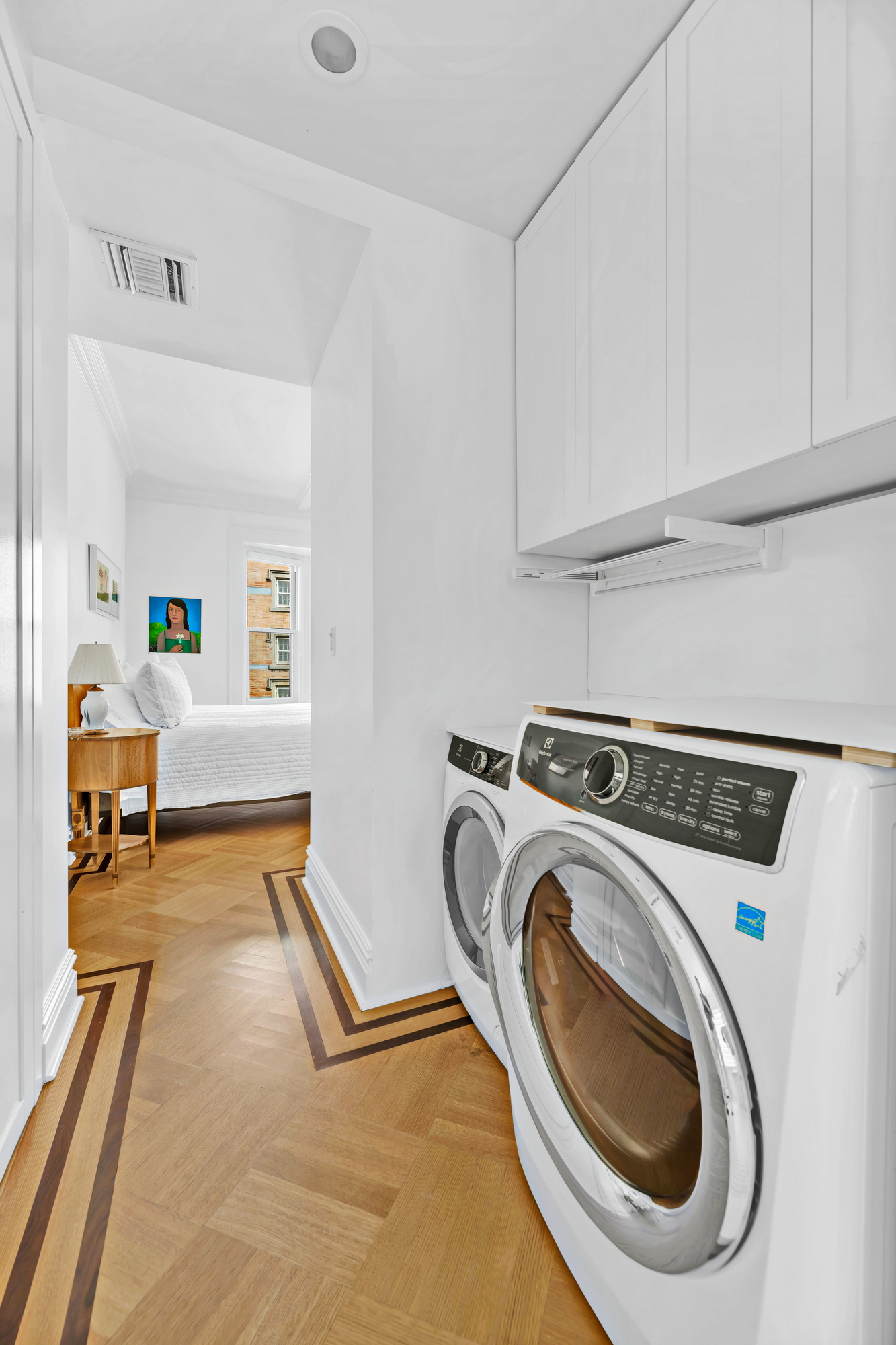 254 West 82nd Street, Unit 5A Manhattan, NY 10024 - Photo 8 of 18 a view of storage and utility room with washer and dryer