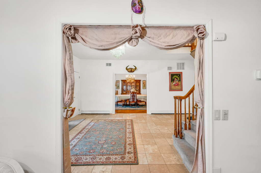 35 Poe Street Staten Island, NY 10307 - Photo 7 of 36 a view of a hallway and a livingroom with furniture