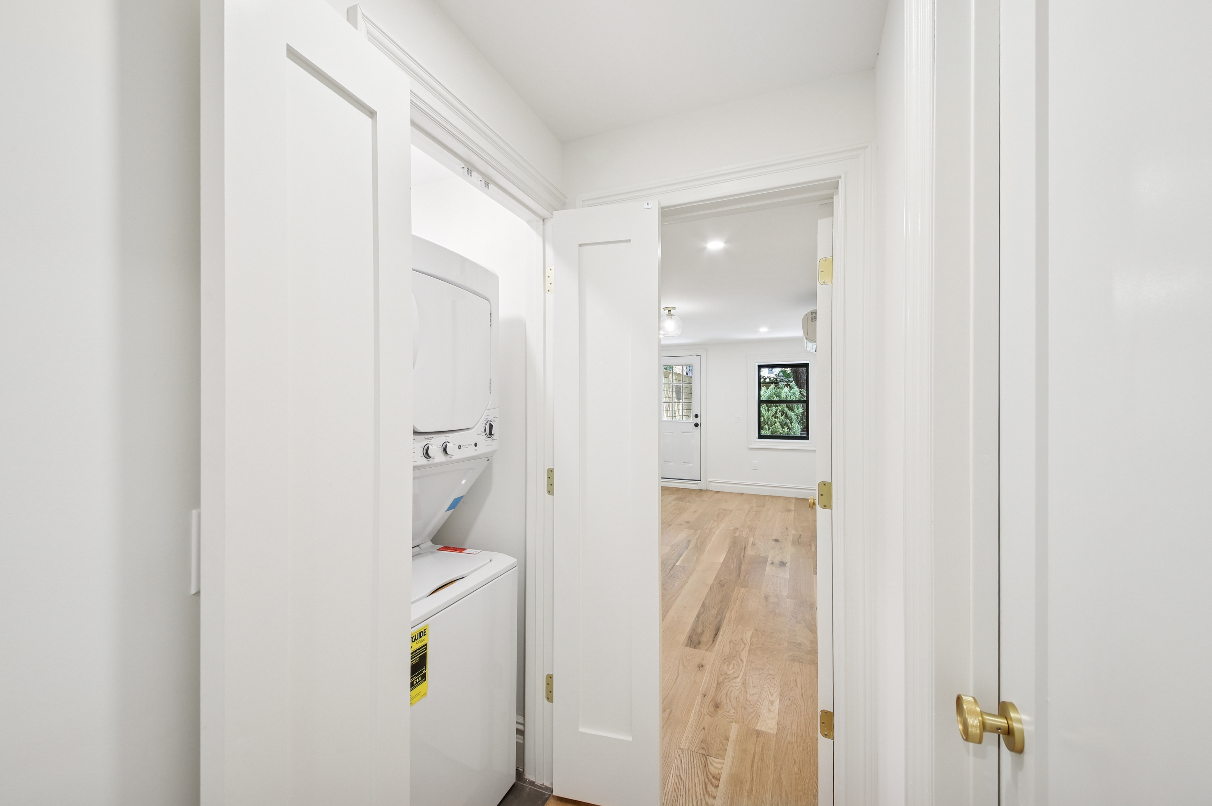 239 Madison Street, Unit 1 Brooklyn, NY 11216 - Photo 3 of 14 a bathroom with a bathtub and shower