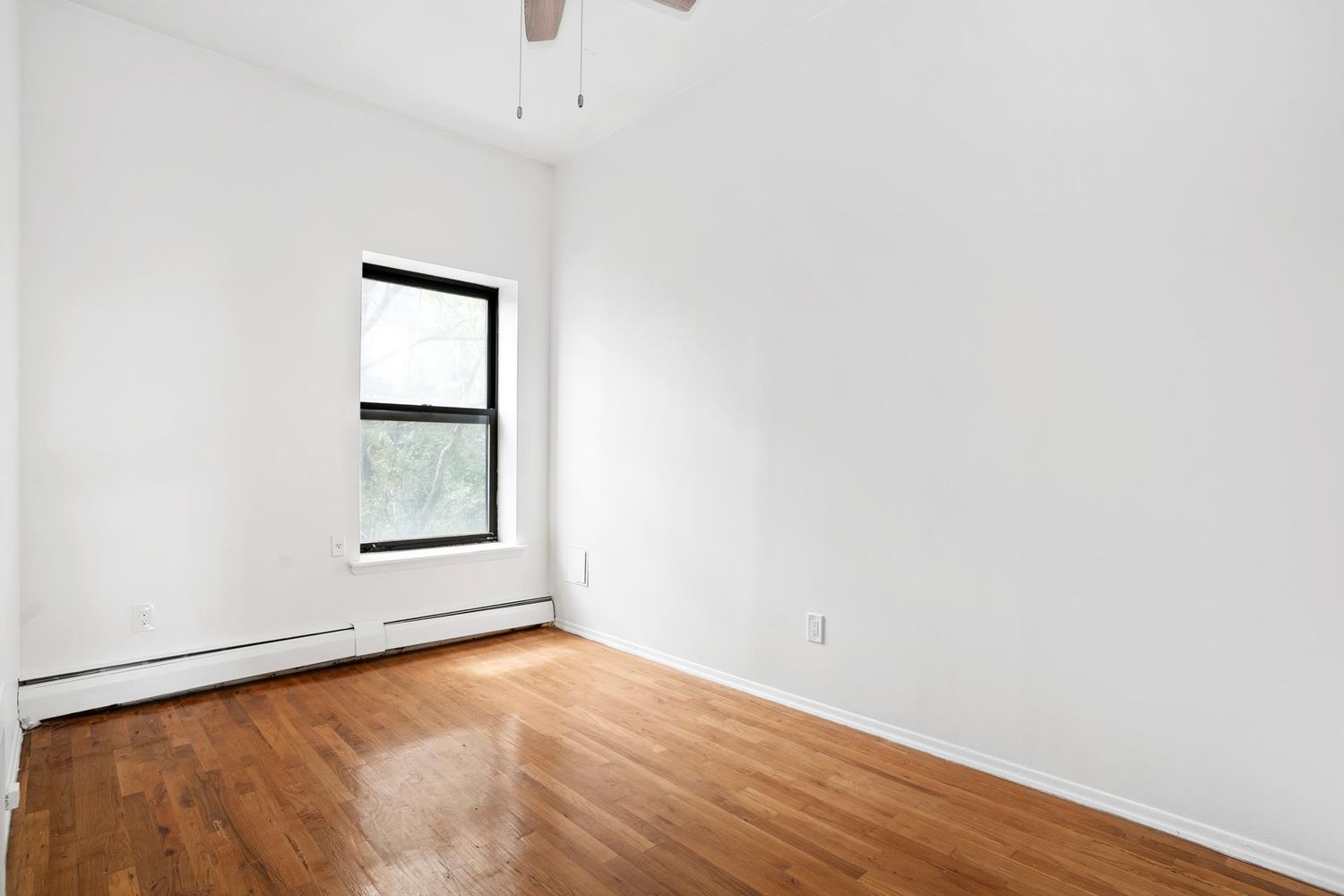 46 West 126th Street, Unit 3 Manhattan, NY 10027 - Photo 5 of 8 an empty room with a window
