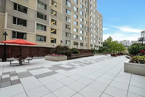 a building exterior with stairs and windows