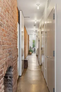 a view of a bathroom with shower