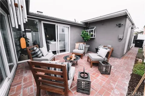 a view of outdoor seating space with furniture