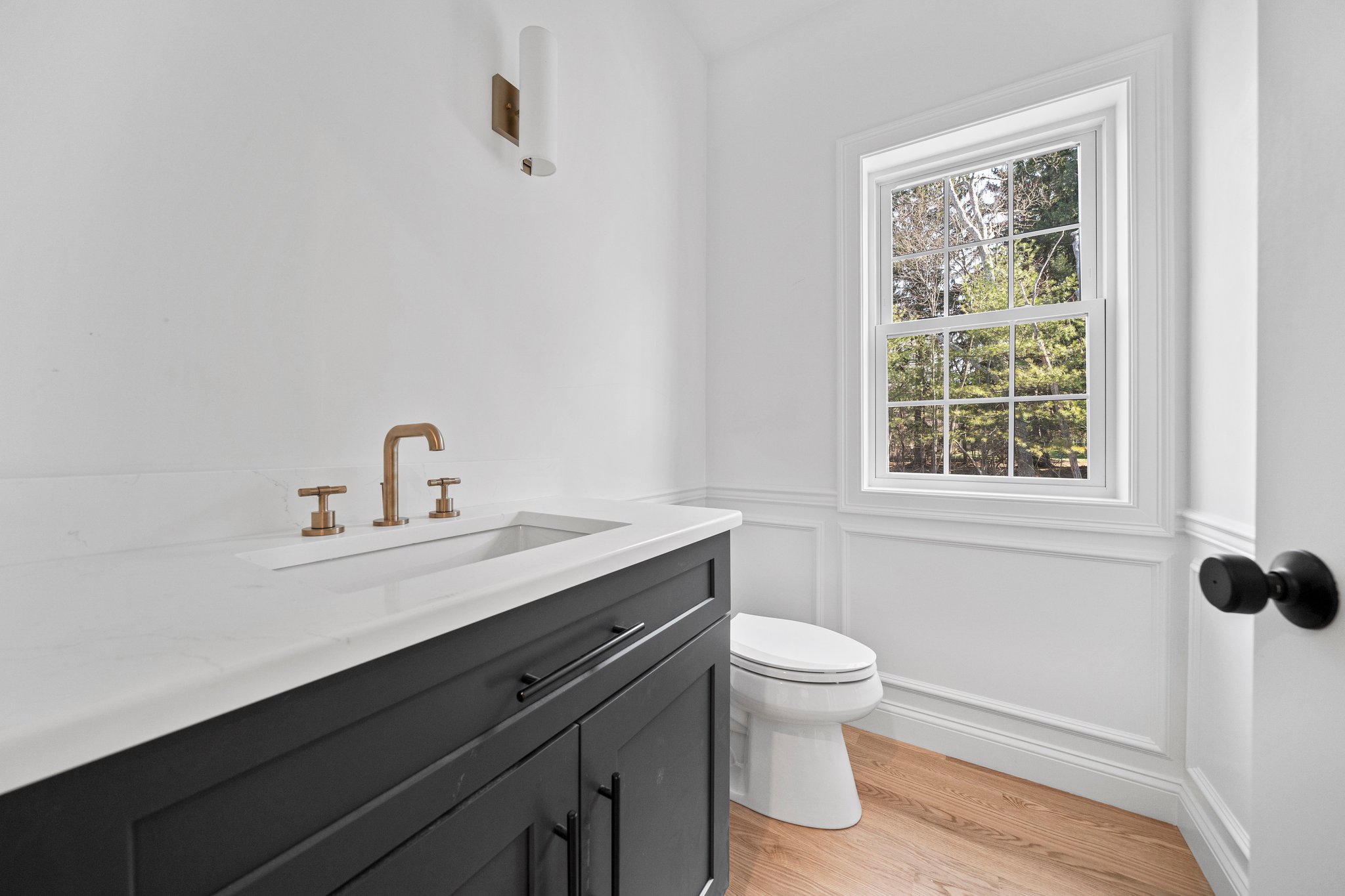3 Everendon Road Canton, MA 02021 - Photo 8 of 35 a bathroom with a sink a toilet and a window
