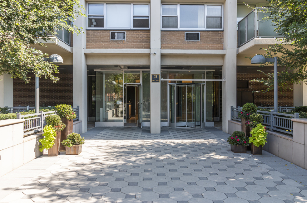 75 Henry Street, Unit 25J Brooklyn, NY 11201 - Photo 12 of 15 a view of a building with sitting area and garden