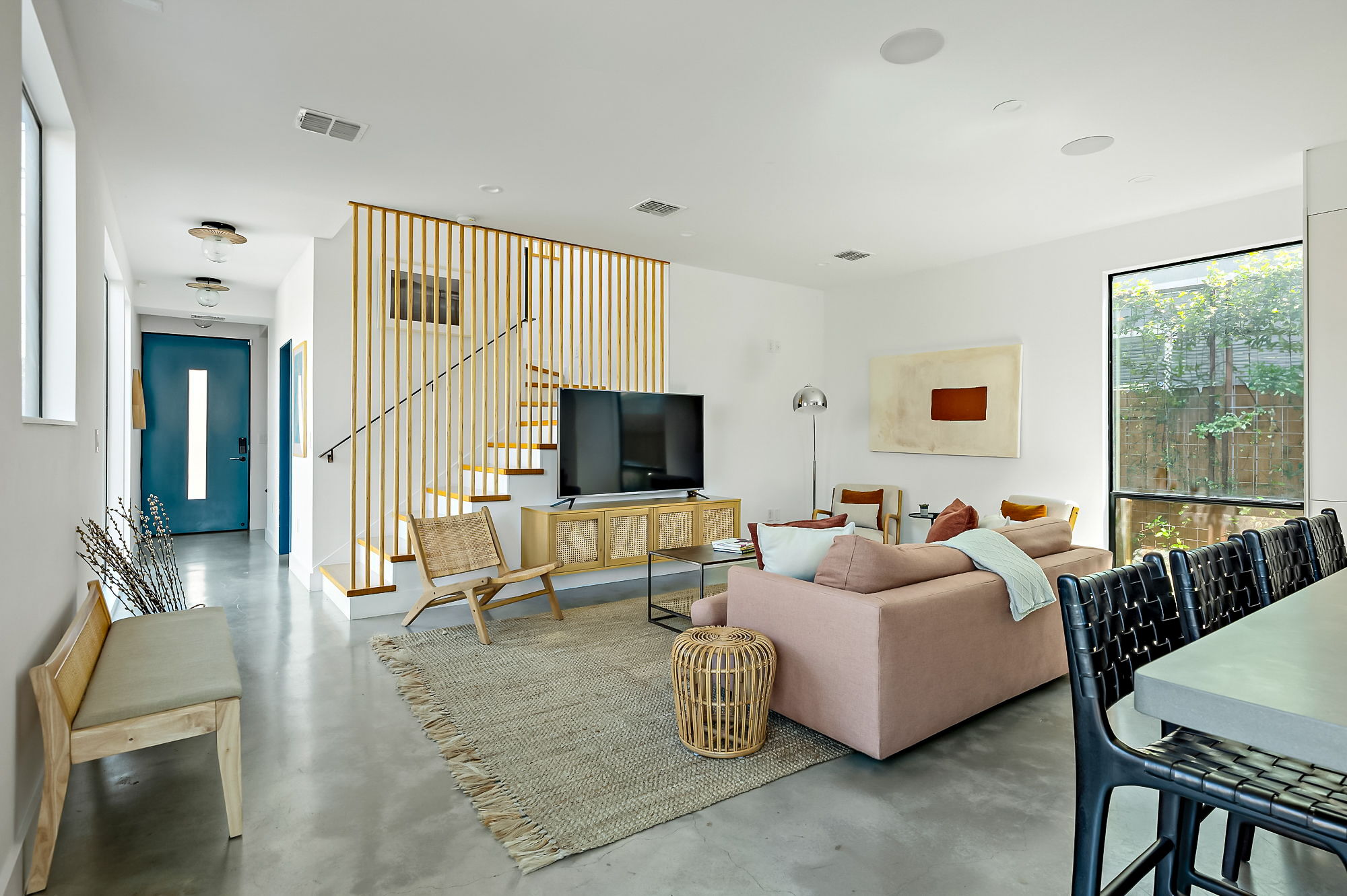 2201 Santa Rosa Street Austin, TX 78702 - Photo 5 of 47 a living room with furniture wooden floor and a large window