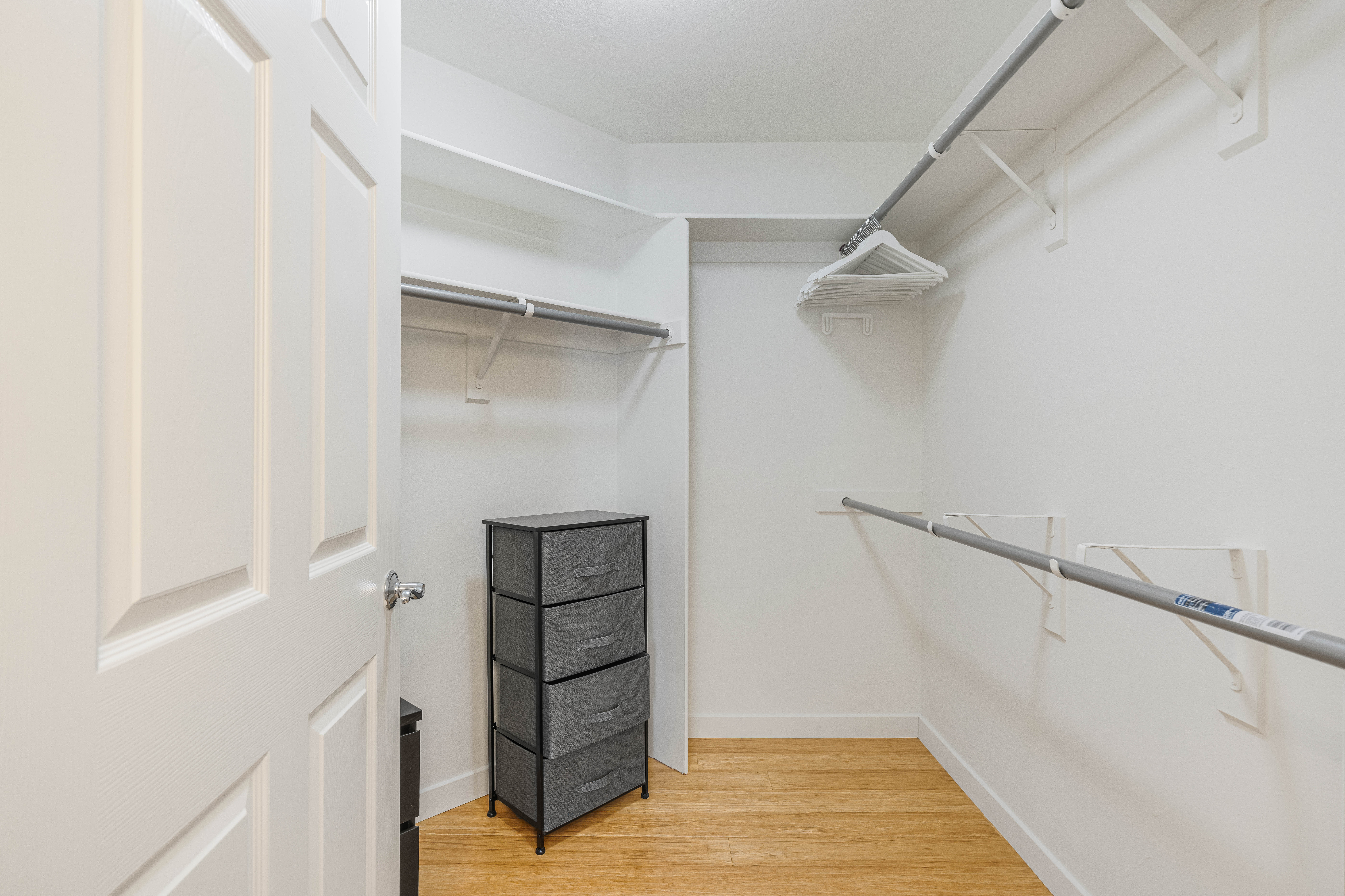 12963 West Runway Road Playa Vista, CA 90094 - Photo 12 of 39 a view of walk in closet with empty racks