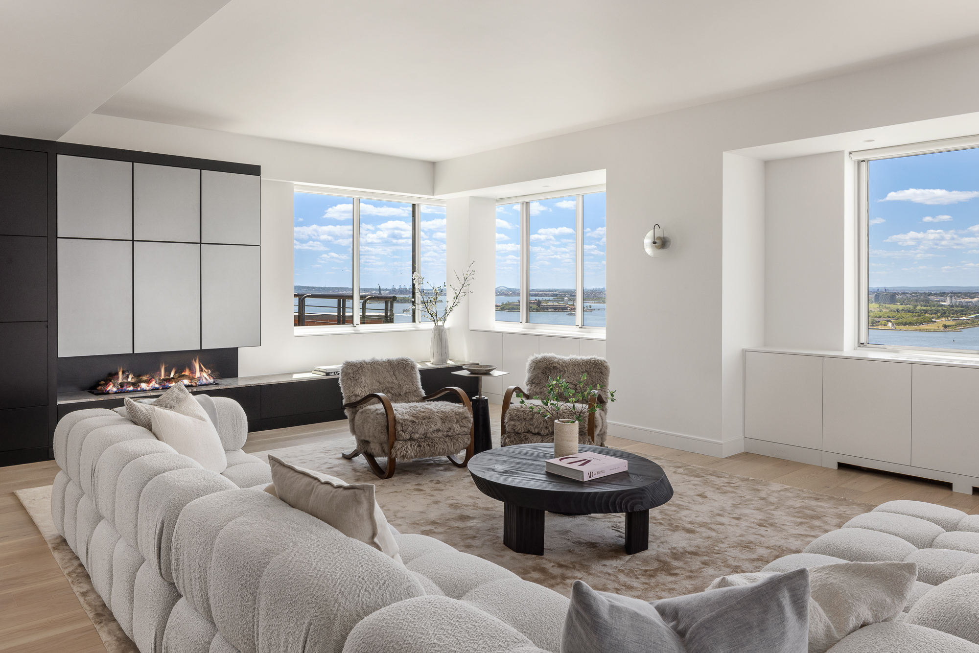 377 Rector Place, Unit PHA Manhattan, NY 10280 - Photo 1 of 48 a living room with furniture and a large window