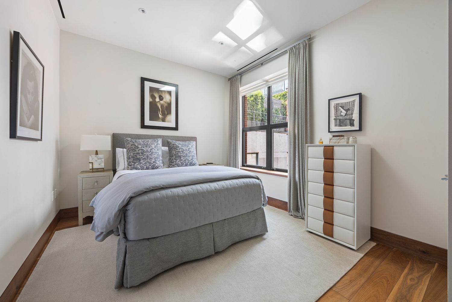 a bedroom with a bed and a walk in closet