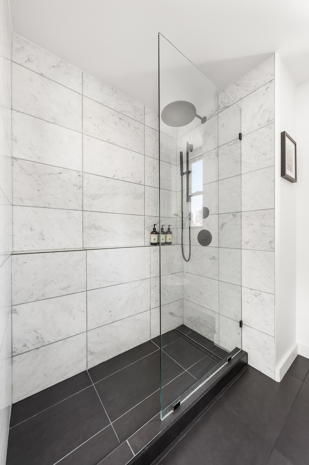 365 West 20th Street, Unit 14B Manhattan, NY 10011 - Photo 14 of 21 a bathroom with a shower