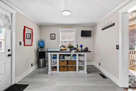 a view of a livingroom with furniture and window