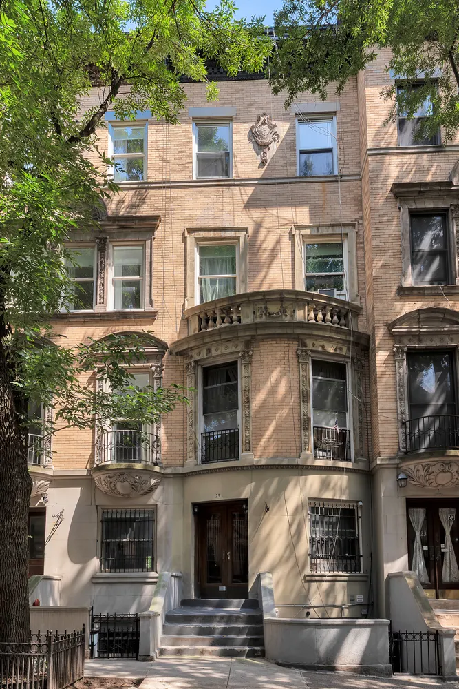 a front view of a building with many windows