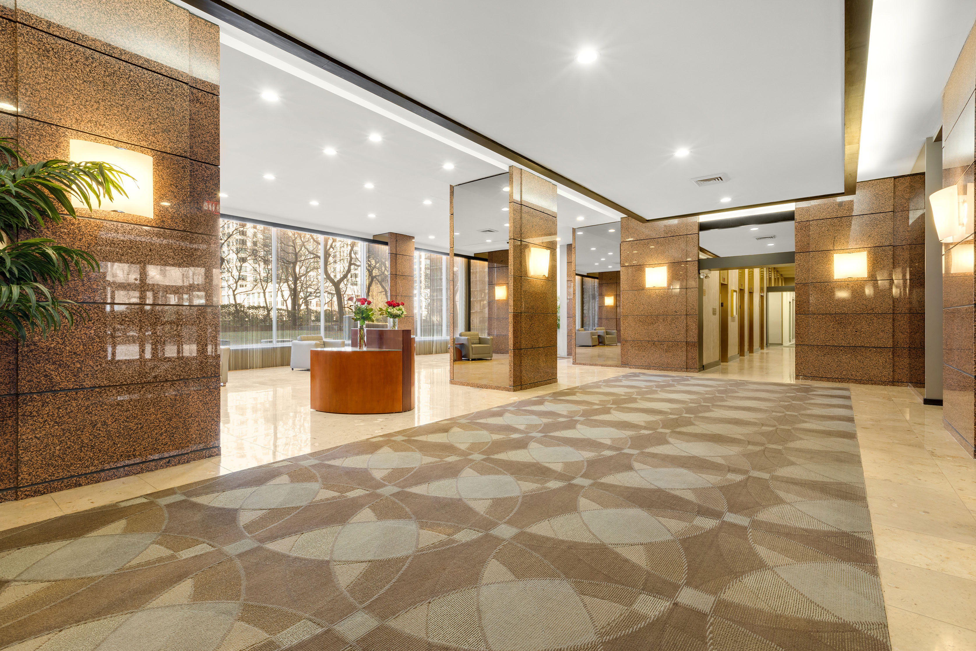 185 West End Avenue, Unit 24H Manhattan, NY 10023 - Photo 7 of 10 a view of a hallway with a chandelier