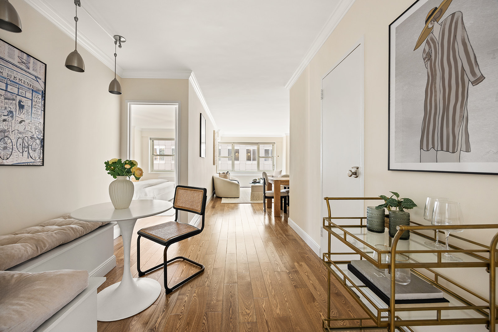 159 West 53rd Street, Unit 27H Manhattan, NY 10019 - Photo 3 of 15 a view of a livingroom with furniture and wooden floor